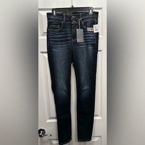 Buckle Black woman’s blue jeans